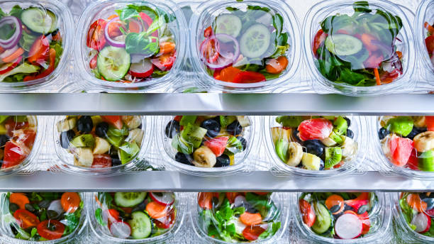 istock Boxes with fruit and vegetable salads in a commercial fridge 1967606812