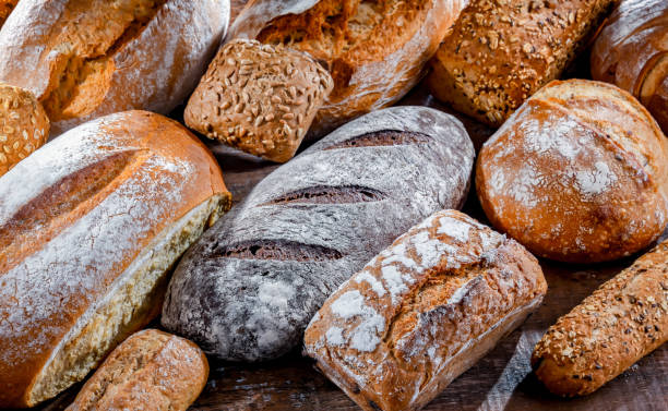 istock Assorted bakery products including loaves of bread and rolls 1967607452
