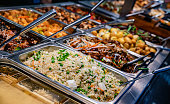 Asian food sold in a shopping mall food court