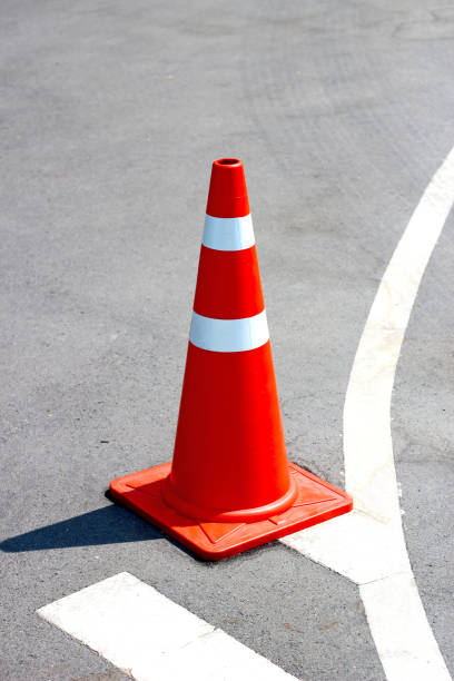 istock Street with orange traffic cone 1967618147