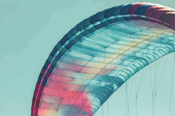 Colorful paraglider close-up against the blue sky