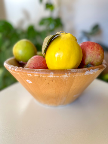 Fresh fruit in wooden bowl