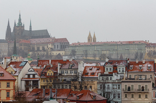 Rooftops oh buildings standing in the city of Prague inthe Czech republic. It was a freezing cold day in winter