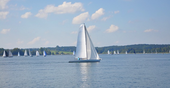 Sailing with sailboat. Long exposure.