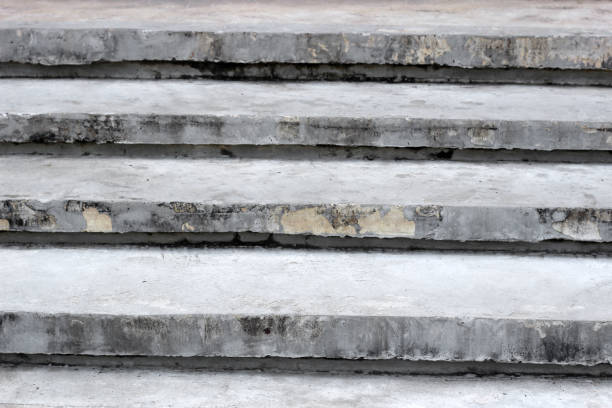 istock Old grey concrete cement stairs 1967692844