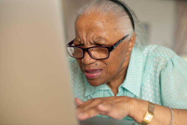 istock Glasses, confused old woman with laptop and problem with network, connection or online glitch in home. Computer, email or senior person with technology, error or internet signal issue on web in house 1967712205