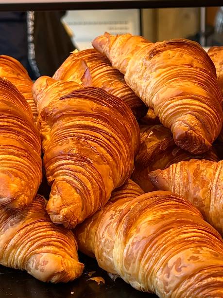 istock Golden and Crispy croissants in a bakery shop 1967772377