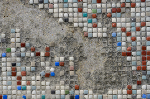 Texture from a multi-colored small tile. Colorful small square randomly. High quality photo tiles.