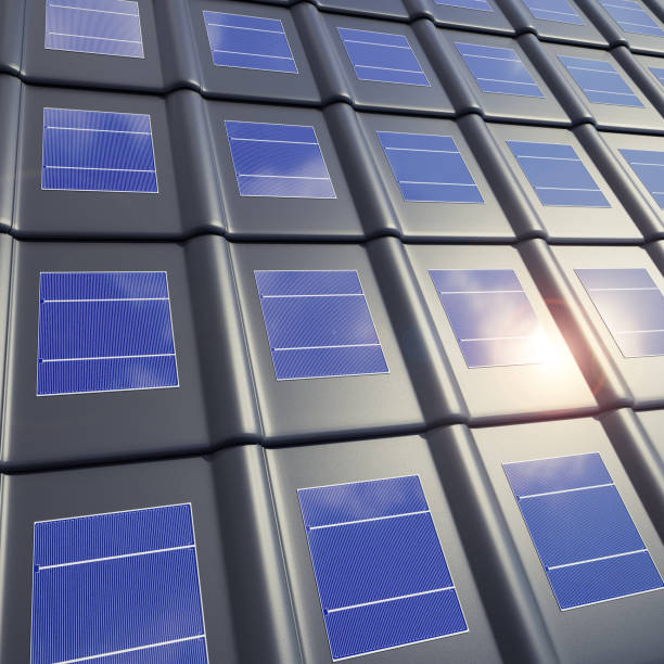 istock Solar panels embedded into roof tiles. Solar roof tiles. Selective focus - full frame 1967792016