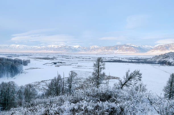 istock Cold snowy mountain landscape at sunset. 1967808931