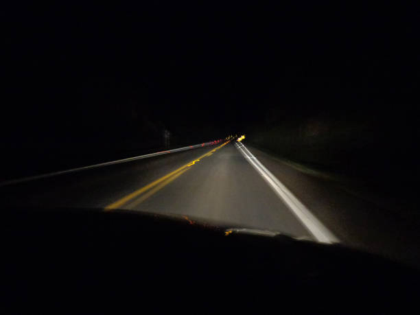 istock Consequences of a drunk driver in a car accident, blurred vision, driving at night 1967847556