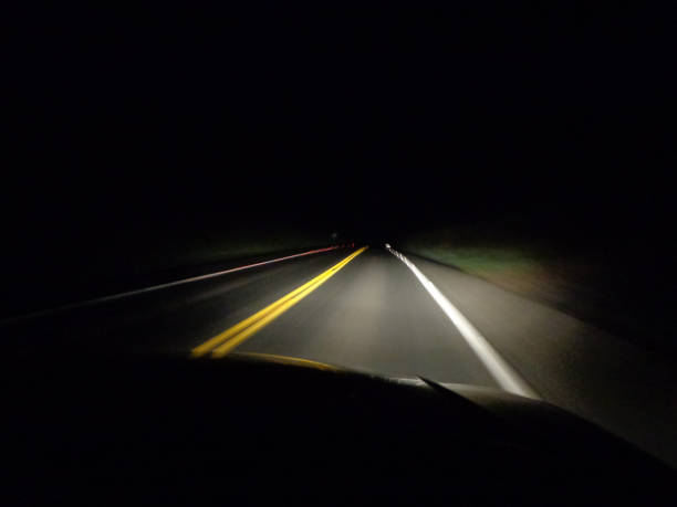 istock Consequences of a drunk driver in a car accident, blurred vision, driving at night 1967847557