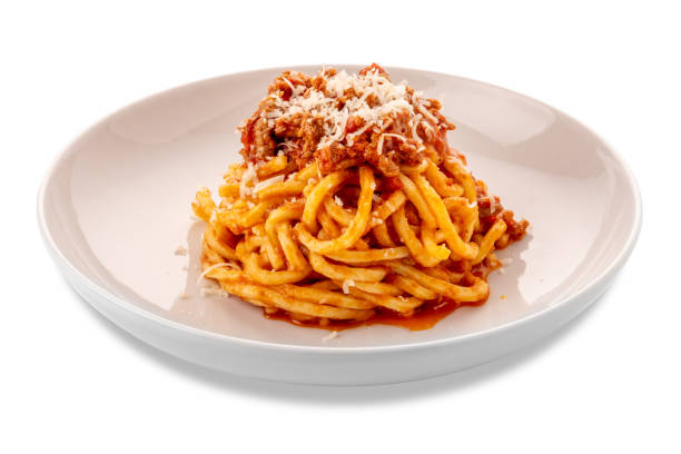 istock Square spaghetti pasta topped with red tomato sauce ragout with meat 1967856435