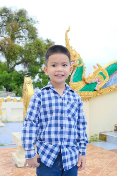 istock A cute boy traveling in a temple. 1967861653