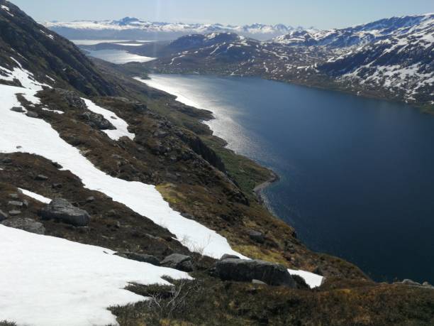 istock View to the mountains, cowered by snow in Norway 1967877598