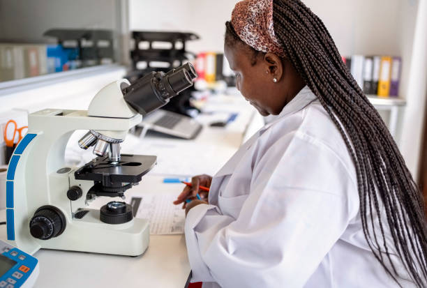 istock African woman pathologist working in laboratory 1967880779