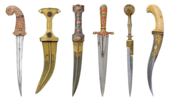 Ancient ornate dagger set isolated