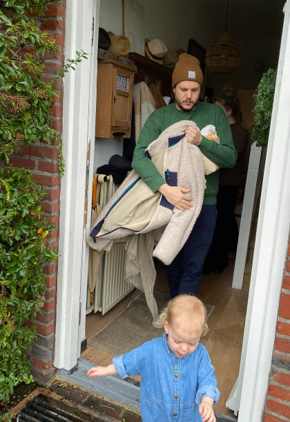 istock Pregnant family going home. 1967987874