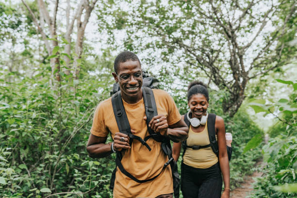 istock Tourists on walking on forest trail 1967992070