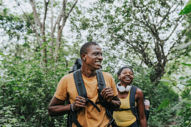 istock Tourists on walking on forest trail 1967998881