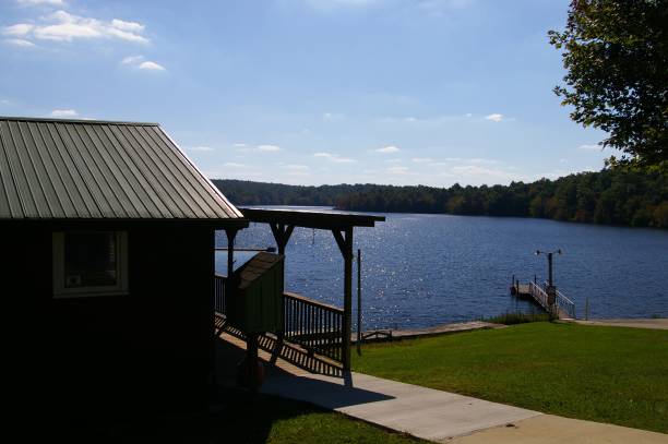 istock Lake with blue sky and trees 1968030538