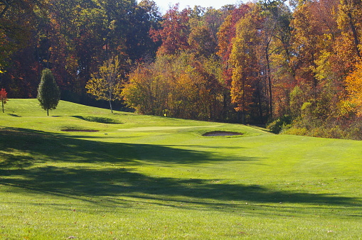 View of a golf course in the autumn with colors