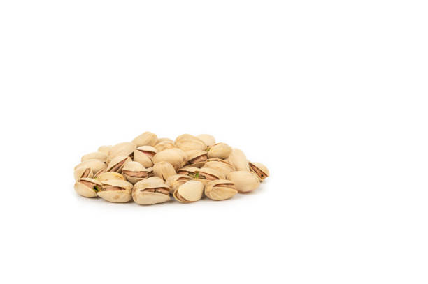 istock Heap of pistachios isolated on a white background 1968037001