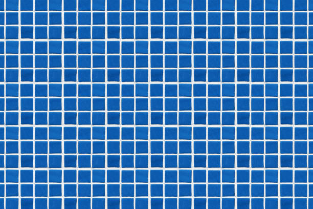 Small tiles on the bottom of the pool, underwater photo. High quality photo