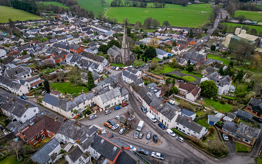Uffculme, Devon, Aerial Drone shot featuring St Mary's Church and the town square