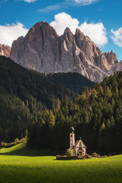 istock mountains and church 1968154893
