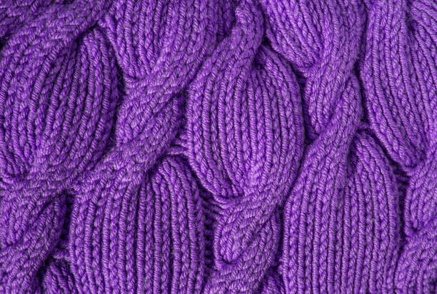 Handmade purple knitting wool texture background. Polyester cotton texture. Vintage knitting wool texture background.