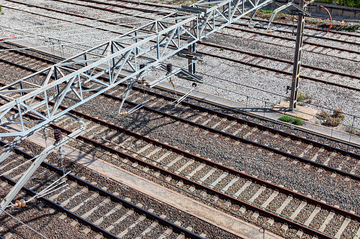 Railway tracks with rails and steel supports, view from above