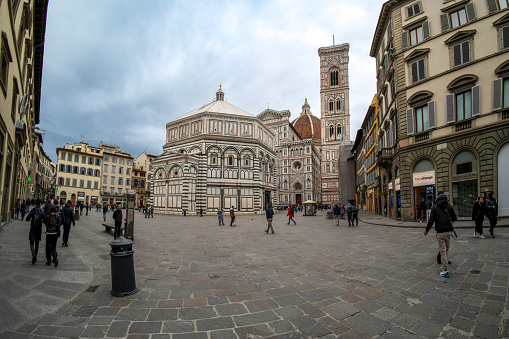 Florence, Tuscany, Italy: As a continuation to the west of the Piazza del Duomo, Piazza San Giovanni opens up, taking its name from the Baptistery, a structure characterized by an octagonal plan with white and green marble.