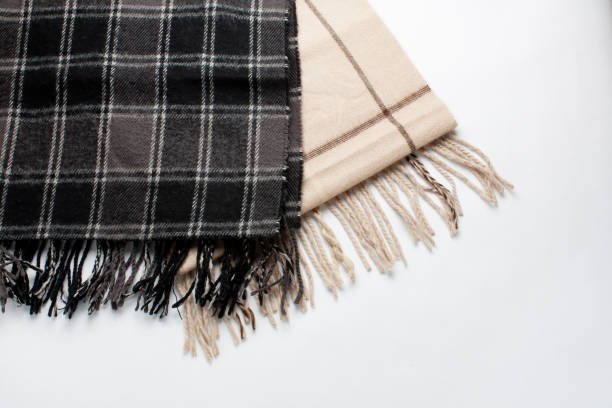 istock Plaid knitted scarves on a white background. 1968256023