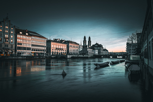 View of the old town of Zurich in Switzerland with Grossmunster right after sunset - High Quality