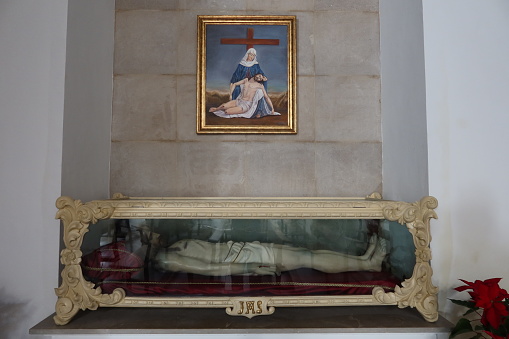 Busot, Alicante, Spain, January 28, 2024: Jesus Christ reclining in the San Lorenzo Martir Church, 16th century. Busot, Alicante, Spain