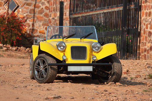 beach buggy cheap replica of a vintage yellow classic car