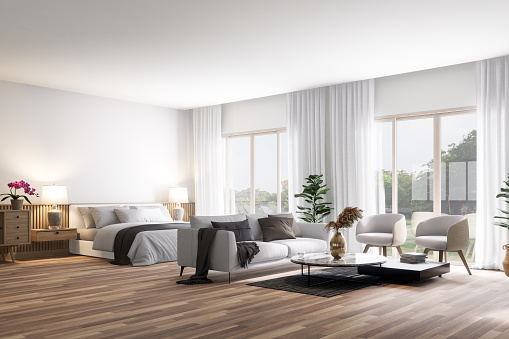 Modern contemporary  style bedroom and living room with  nature view 3d render, There are parquet floor decorate with white fabric furniture, There are large window overlooking garden view