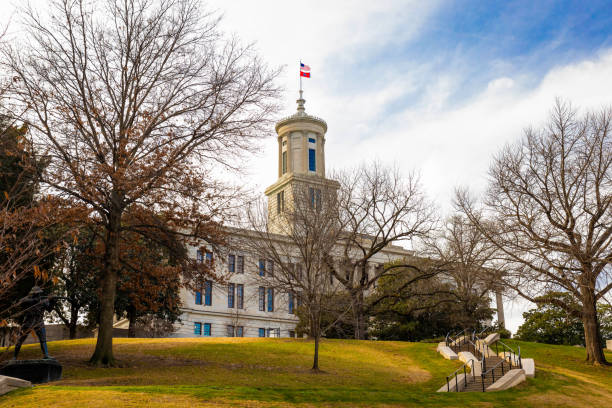 Aerial view of the beautiful Tennessee State Capitol Building sitting atop a hill in downtown Nashville, Tennessee, completed in 1859, and is one of the state's best examples of \