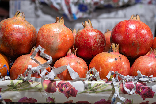 fresh pomegranate at fruit store for sale at evening