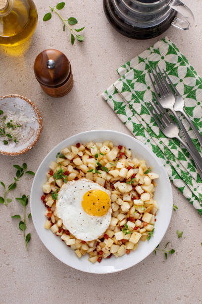 istock Potato hash with pancetta topped with a fried egg 1968520761
