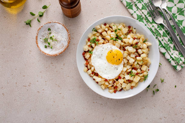 istock Potato hash with pancetta topped with a fried egg 1968520766