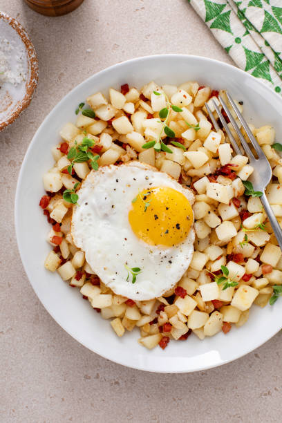 istock Potato hash with pancetta topped with a fried egg 1968520768