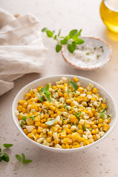 istock Sauteed yellow and white corn with herbs, healthy side dish idea 1968520792