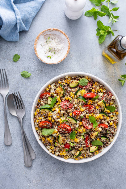 istock Warm quinoa salad with tomatoes, corn and zucchini 1968521346