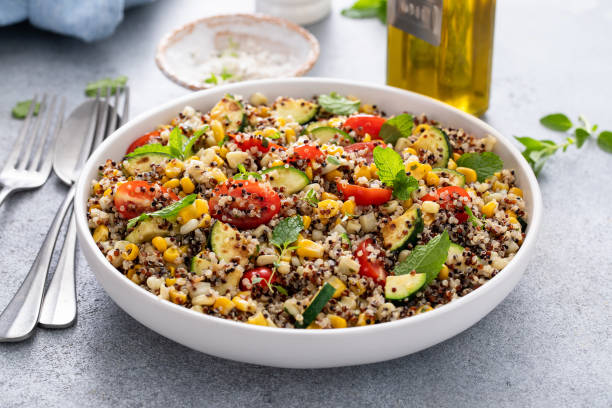 istock Warm quinoa salad with tomatoes, corn and zucchini 1968521348