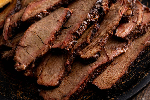 istock Sliced smoked brisket on a serving plate with toast 1968538023