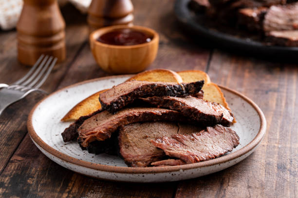 istock Sliced smoked brisket on a plate with toast 1968538042