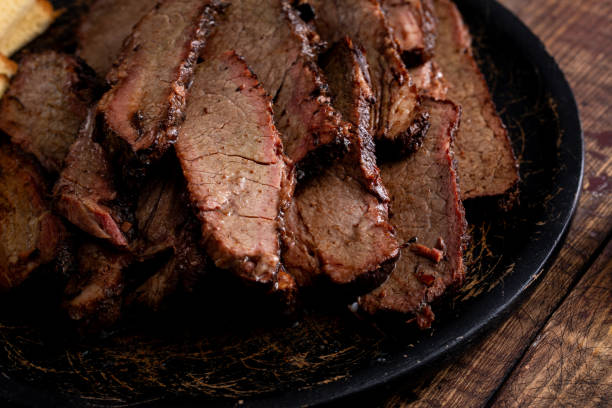 istock Sliced smoked brisket on a serving plate with toast 1968538045