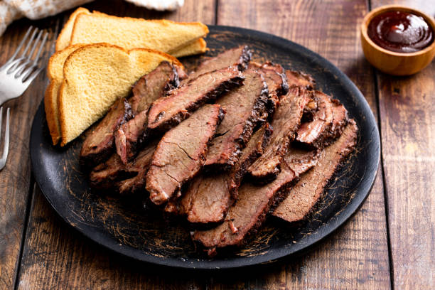 istock Sliced smoked brisket on a serving plate with toast 1968538052